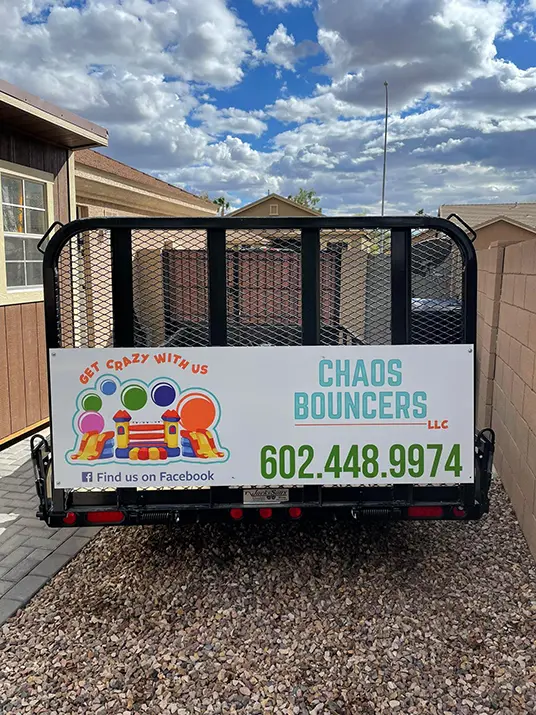 The chaos bouncer trailer sits ready for use for the next party or event