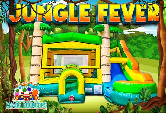 A brightly colored jungle themed bounce house and inflatable slide